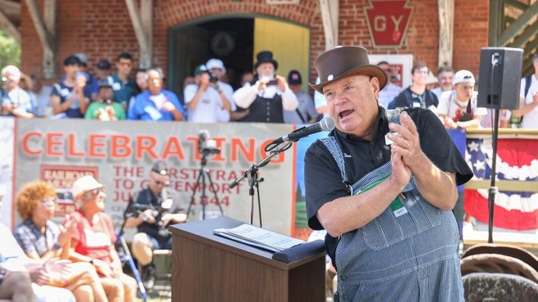 Don Fisher, president of the Railroad Museum of Long Island, speaks...