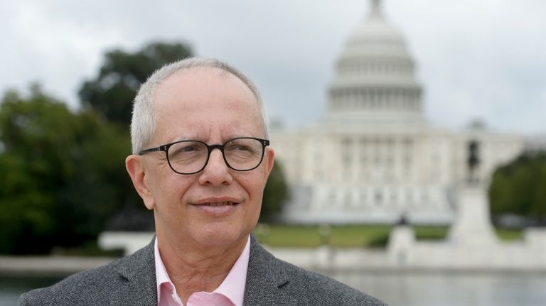 Timothy Kuzma takes time for a portrait near the Capitol...