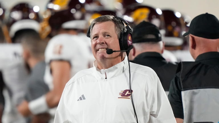 Central Michigan head coach Jim McElwain watches from the sideline...