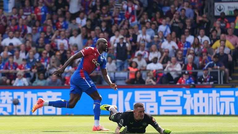 Crystal Palace's Jean-Philippe Mateta scores their side's first goal of...