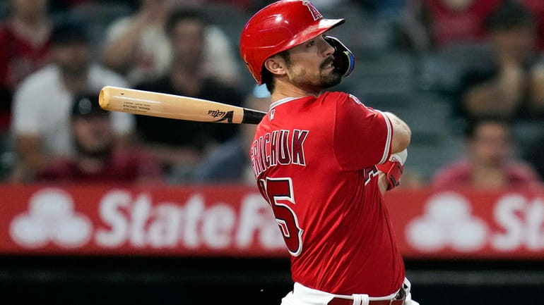 Los Angeles Angels' Randal Grichuk drives in the winning run...