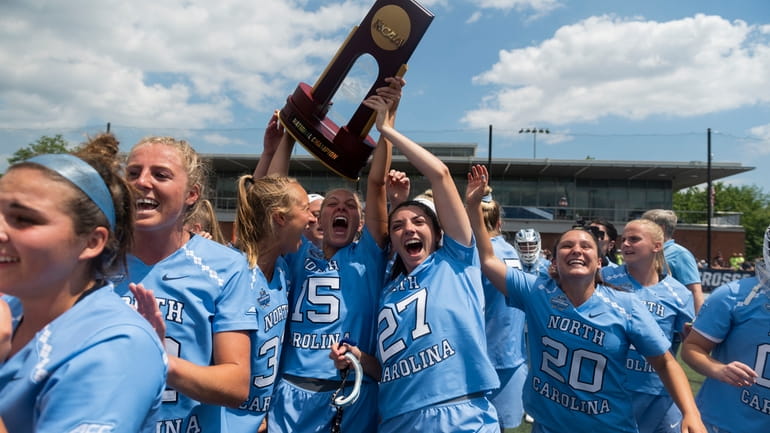 North Carolina players celebrate after winning the NCAA Division I women's...