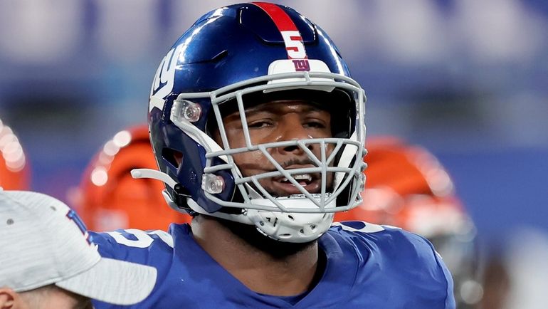 Giants defensive end Kayvon Thibodeaux walks off the field after...