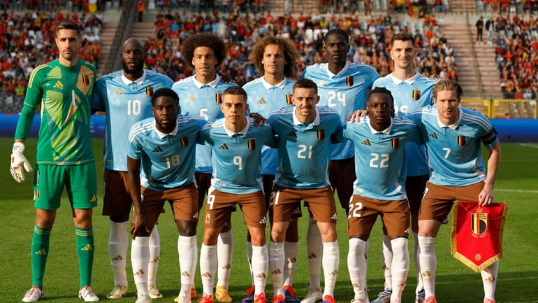 Belgium starting players pose for a team photo at the...
