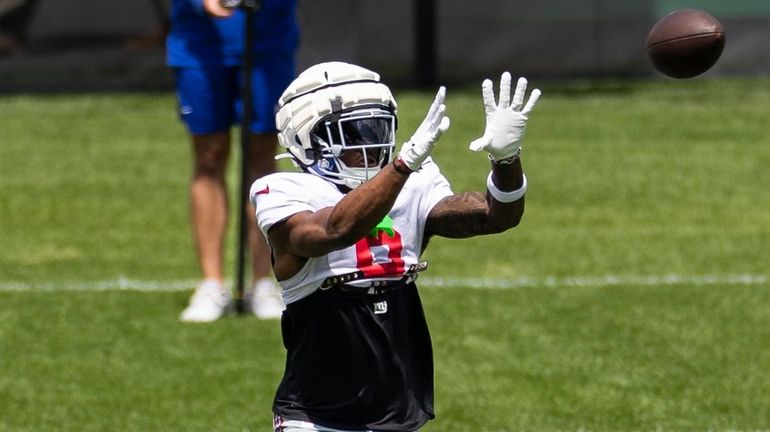 Giants wide receiver Malik Nabers makes a catch during a...