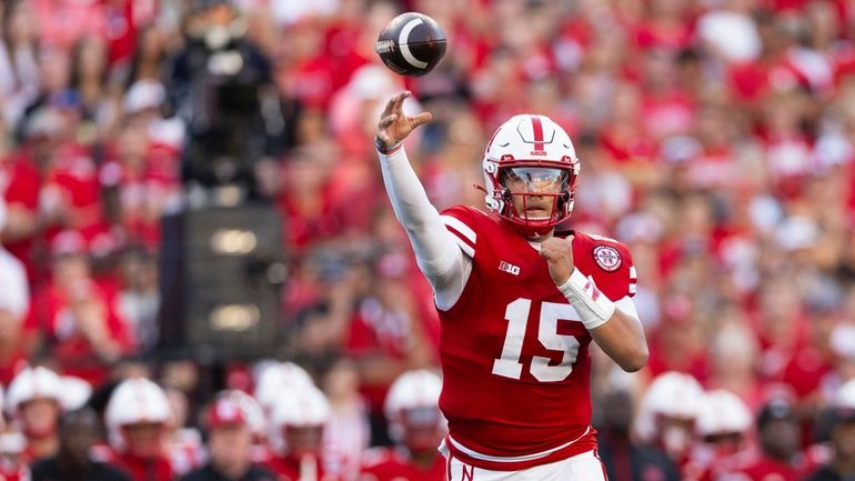 Nebraska quarterback Dylan Raiola (15) passes the ball against Colorado...