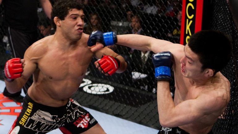 Gilbert Melendez, left, thoroughly dominated Shinya Aoki to retain his...