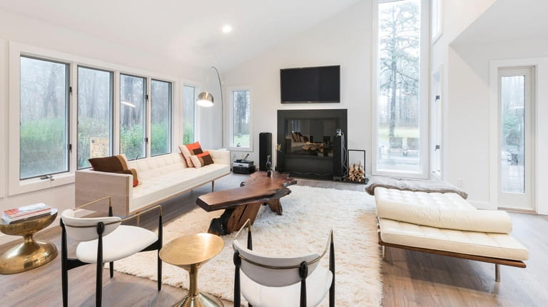 This renovated and expanded Contemporary has seven bedrooms, and five bathroom...