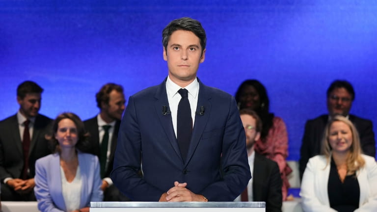 French Prime Minister Gabriel Attal poses prior to a debate...