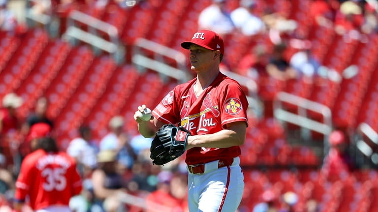 St. Louis Cardinals starting pitcher Sonny Gray prepares to throw...