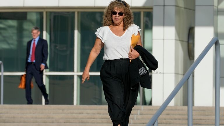 Nancy Marks leaves federal court, Thursday, Oct. 5, 2023, in...