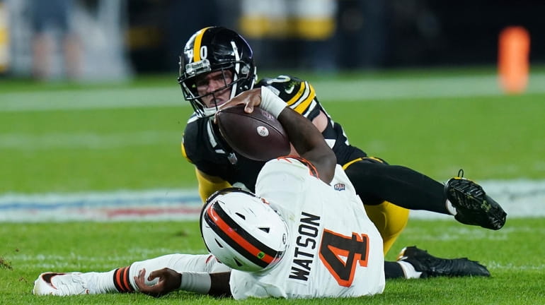 Pittsburgh Steelers linebacker T.J. Watt (90) sacks Cleveland Browns quarterback...