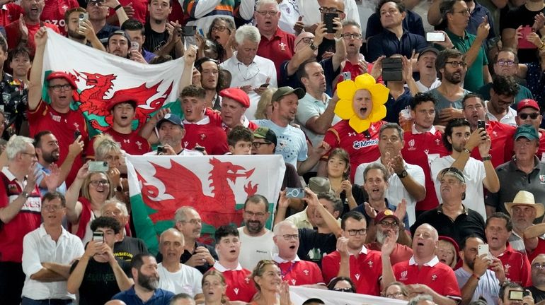 Wales' fans attend the Rugby World Cup Pool C match...