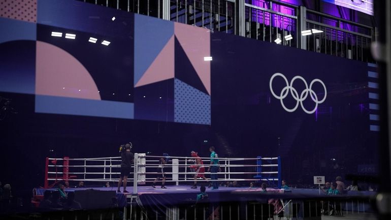 Stand-in boxers are seen in the ring during rehearsals ahead...