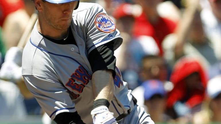 Mets' Jason Bay hits a two-run triple against Washington Nationals...