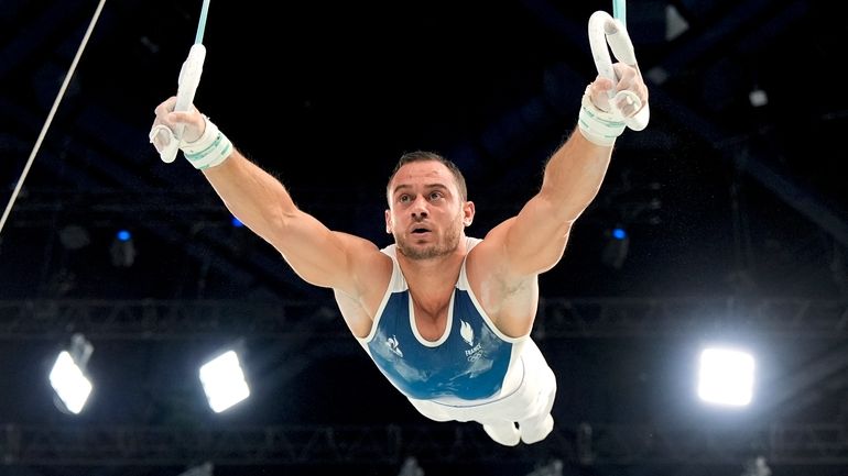 Samir Ait Said, of France, competes during the men's artistic...