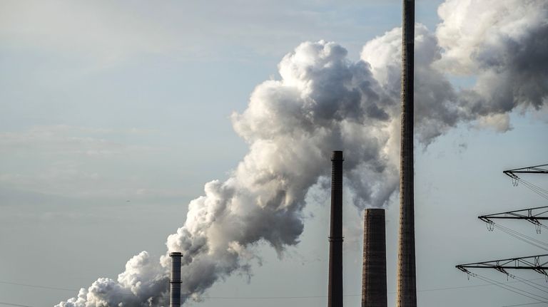 Steam rises from Schwelgern coking plant, which is in operation...