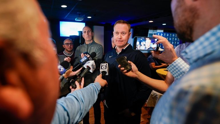 Milwaukee Brewers president of baseball operations Matt Arnold answers questions...