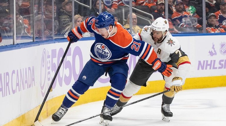 Vegas Golden Knights' Alex Pietrangelo (7) and Edmonton Oilers' Adam...