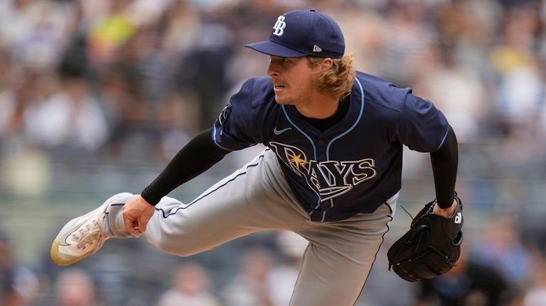 Rays pitcher Tyler Zuber throws during the sixth inning of...