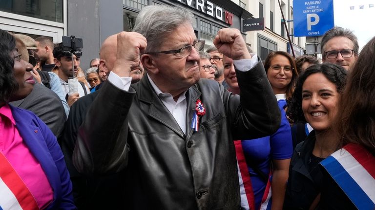 France Unbowed leader Jean-Luc Melenchon, center, who criticized as a...