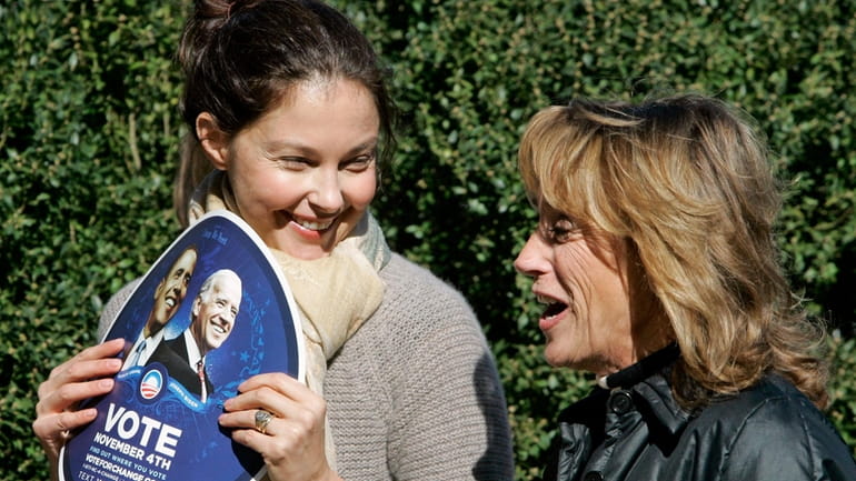 Actress Ashley Judd, left, talks with Valerie Biden Owens, sister...