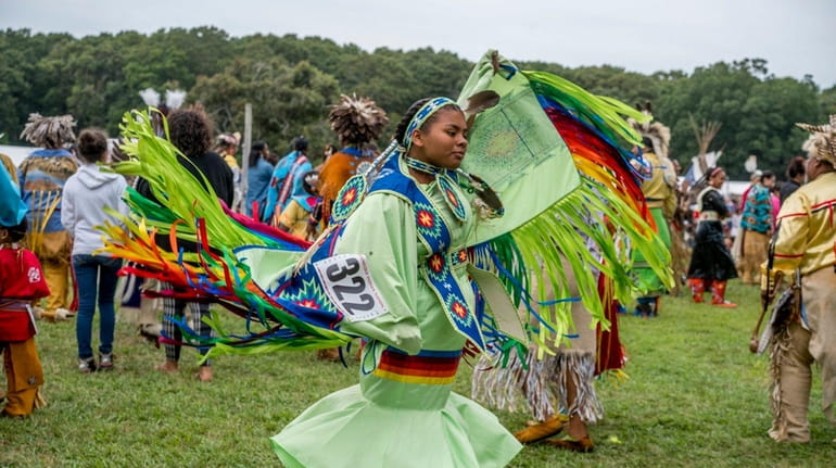 Dancers perform during the 70th annual Shinnecock Powwow in Southampton...