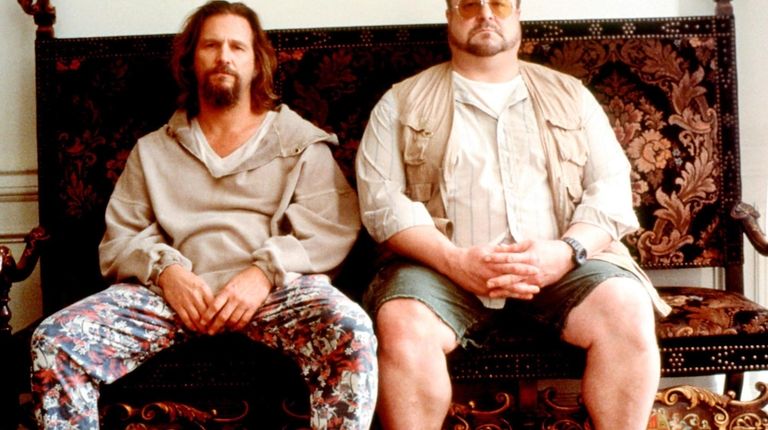 Jeff Bridges, left, as "The Dude" and John Goodman star...