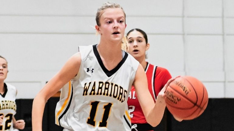 Juliana Cerasi of Wantagh dribbles downcourt during a Nassau girls basketball...