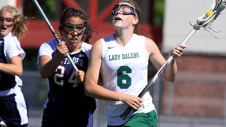 Farmingdale's Kelly McPartland gets down field in hurry. (June 11,...