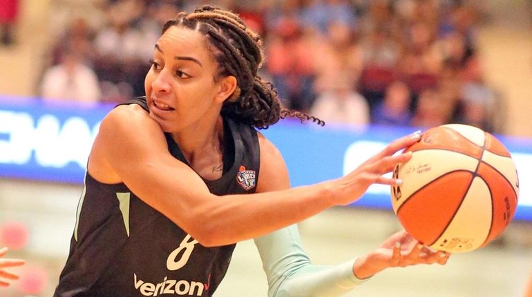 The Liberty's Bria Hartley passes against the Chicago Sky at the Westchester...