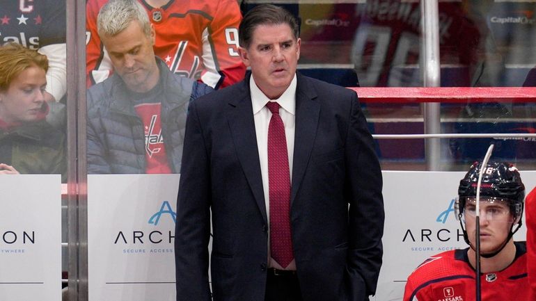 Washington Capitals head coach Peter Laviolette looks on during the...