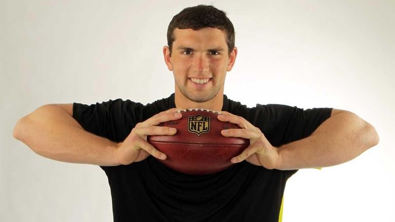 Andrew Luck posing during the NFL combine, in Indianapolis. (Feb....