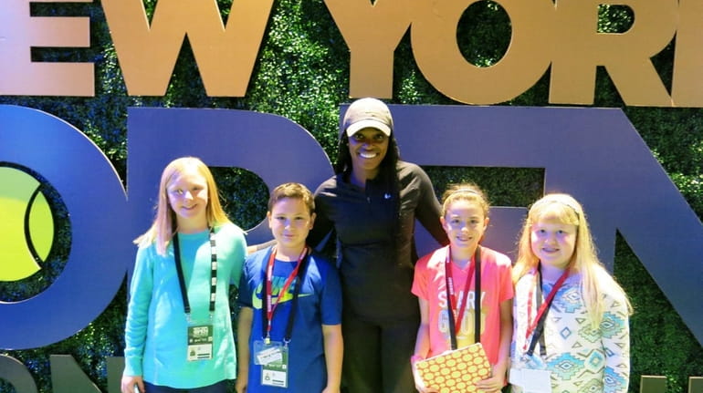 Tennis player Sloane Stephens, center, with Kidsday reporters Reese Pearsall,...
