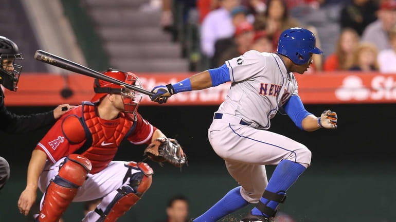 Curtis Granderson of New York Mets touched by fan during game