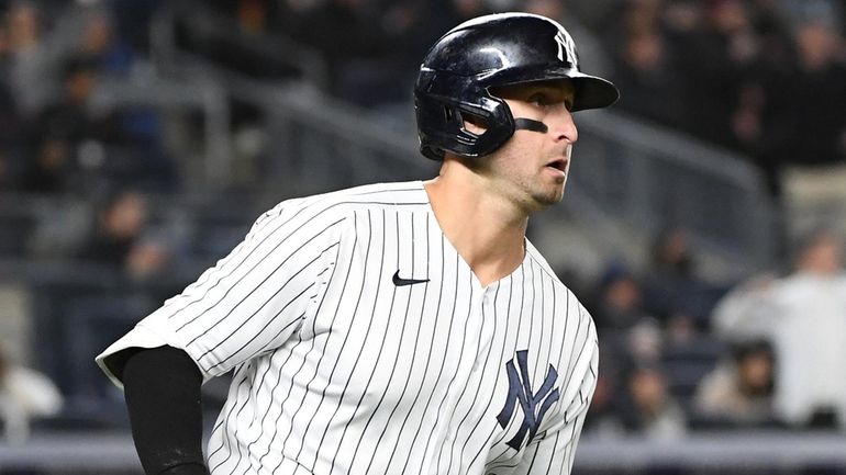 Yankees left fielder Joey Gallo rounds the bases on his...