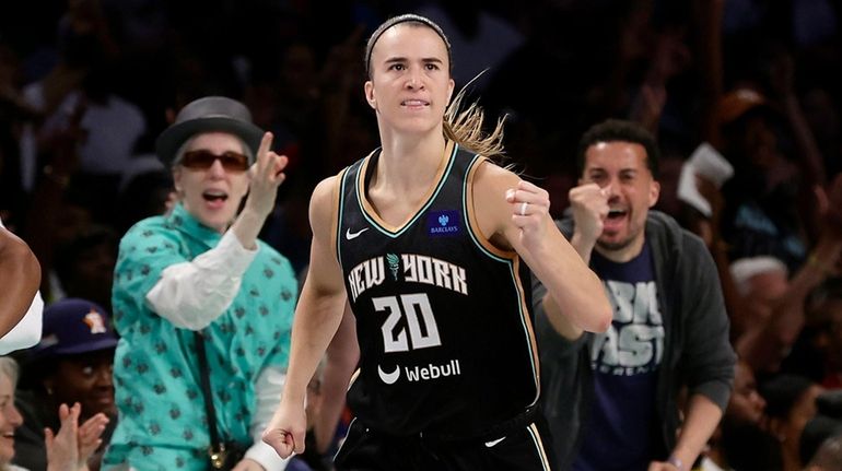 Sabrina Ionescu of the Liberty reacts after a three-point basket during the...