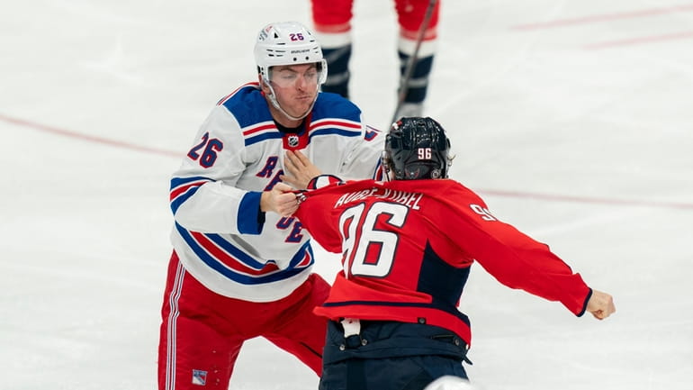 Rangers left wing Jimmy Vesey (26) and Washington Capitals right...