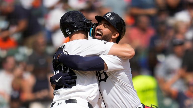 Detroit Tigers' Riley Greene, right, celebrates his two-run home run...