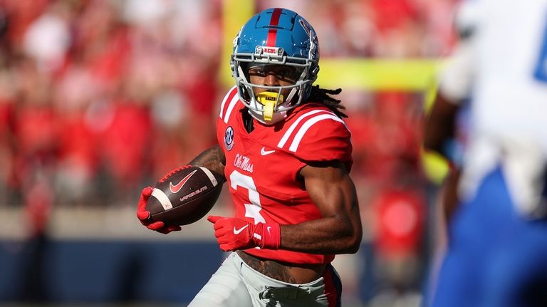 Mississippi wide receiver Antwane Wells Jr. (3) runs the ball...