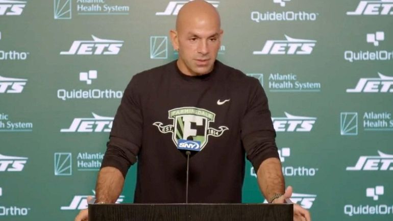 Jets head coach Robert Saleh wears a Farmingdale shirt at...