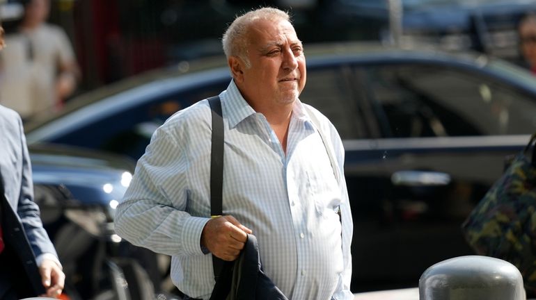 Fred Daibes enters federal court in New York, July 16,...