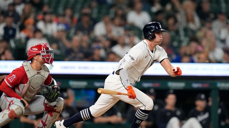 Detroit Tigers' Kerry Carpenter connects for a RBI single to...