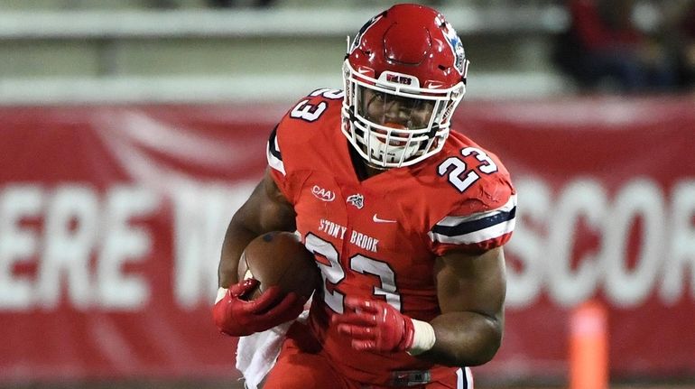 Stony Brook running back Jordan Gowins runs the football for...