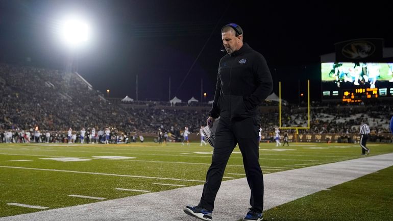 Florida head coach Billy Napier roams the sidelines during the...