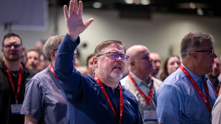 Brian Kent, of Lexington, South Carolina, worships during a Southern...