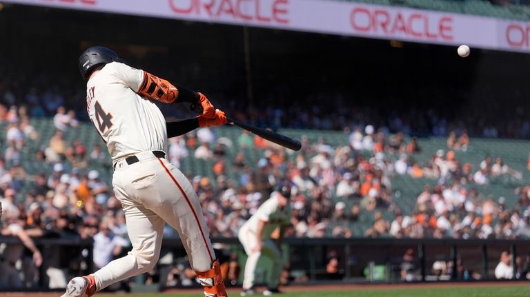 San Francisco Giants' Patrick Bailey hits a ground rule RBI...