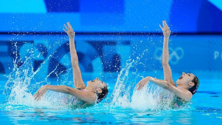 China's Wang Liuyi and Wang Qianyi compete in the duet...