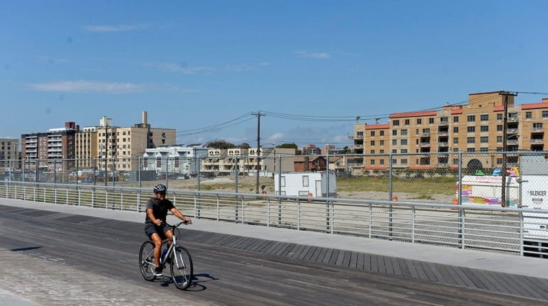 Developers want to build apartment towers near the boardwalk between...