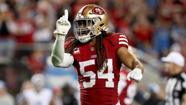 San Francisco 49ers linebacker Fred Warner (54) gestures during the...